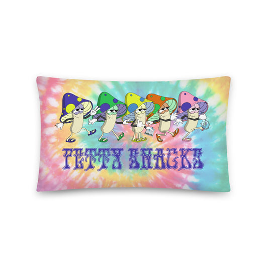 Large graphic printed across entire pillow. Background is pastel rainbow tie dye spiral coloring. There are five mushroom characters walking across in a line, they are blue, green, yellow, orange, and pink. "Petty Snacks" is printed beneath the mushrooms in purple lettering.  They're holding bags of shrooms, joints, and bongs.