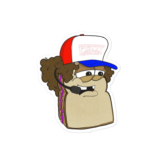 A sticker of a cartoon character peanut butter and jelly sandwich with eyes, a blue and red trucker hat, brown curly hair, and missing his front teeth. A reference to character from Stranger Things. 