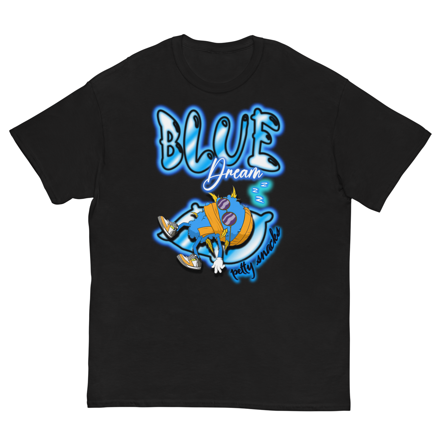 Black tee. Big blue airbrush style lettering that reads "Blue Dream" on top. Below that, a blue weed nugget character wearing orange beanie sleeping on an pillow. The brand name "Petty Snacks" is under the pillow in small airbrush style